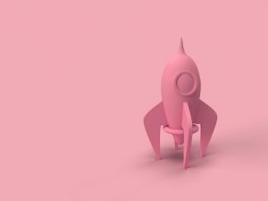 A retro spaceship rocket set against ready to launch. 3D illustration.